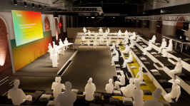 Visualisierung der Themenwelt 'Arena' auf dem BDEW Kongress 2025 mit Blick von links